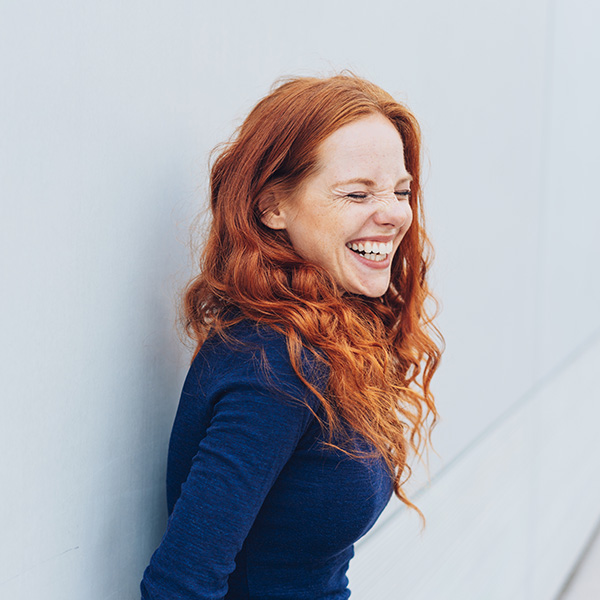 Woman smiling showing her white teeth