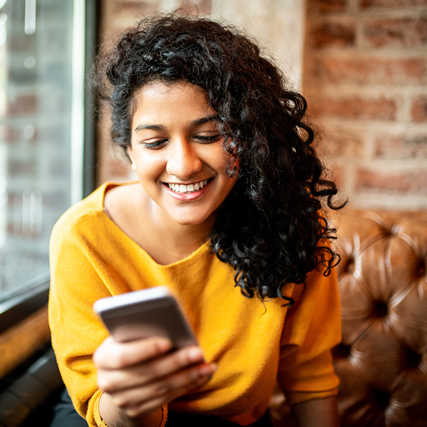 Woman smiling showing her white teeth