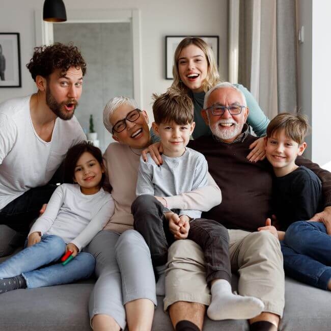 Happy family smiling in living room