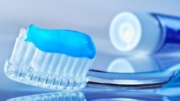 Tooth paste on a brush