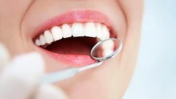 Dentist examining a patient