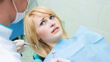 Dentist with a patient