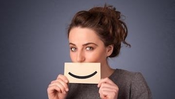 woman not showing her smile