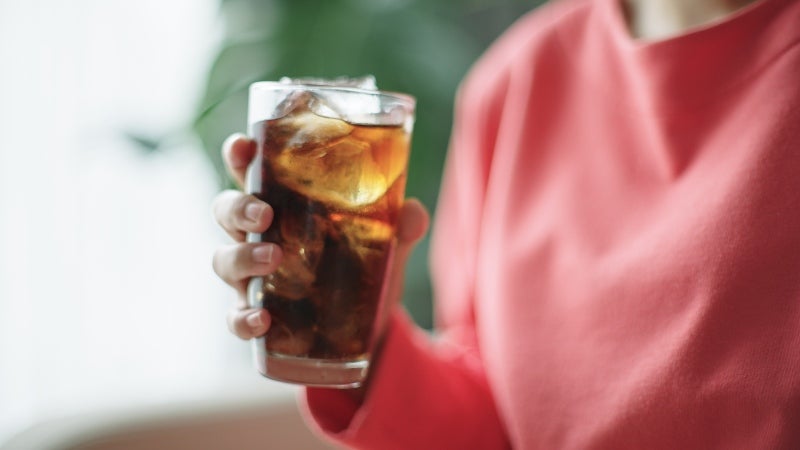 Woman drinking a chilled coke