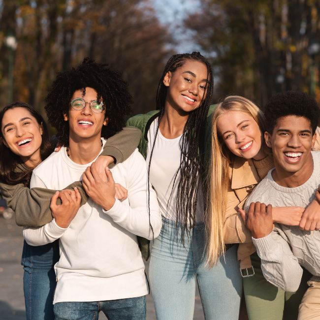 Group of friends smiling and having fun outdoors