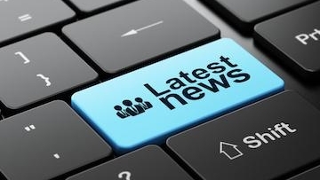 Latest News written on keyboard
