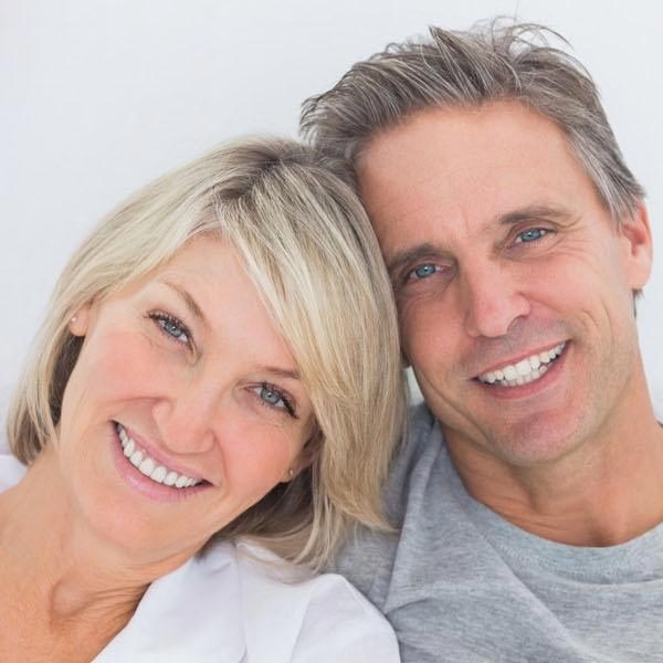 A couple undergoing expert periodontal treatment in North Phoenix, AZ