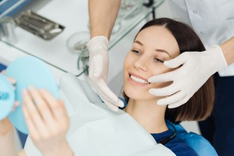 Woman undergoing common dental services in Northern Phoenix, AZ