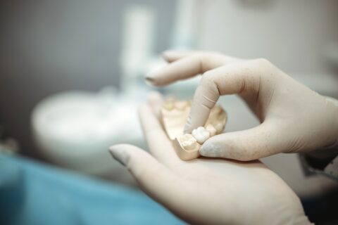 A dentist in North Phoenix, AZ, explaining how untreated bone loss can lead to tooth loss.