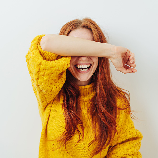 Woman smiling showing her white teeth