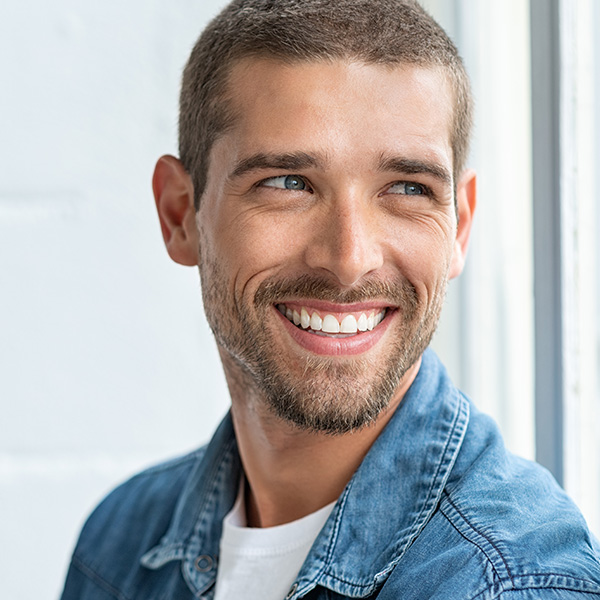 Man smiling showing his white teeth